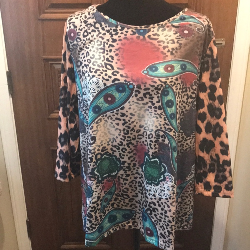 Cute multi color animal print tee. Lightly used.